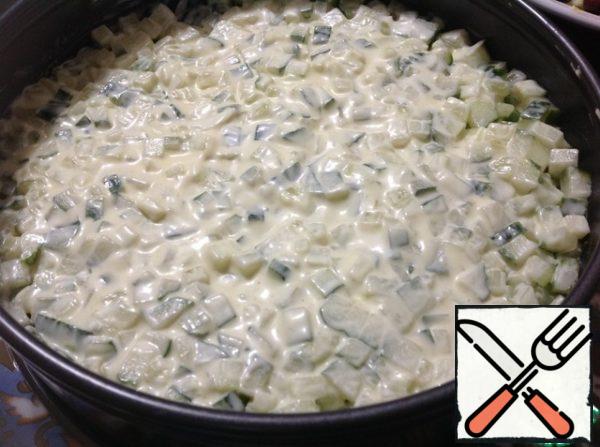 Brush with the remaining mayonnaise. Sprinkle the salad with egg yolk and decorate to your liking.
Let the salad stand for 1-2 hours in a cool place before serving.
Enjoy your meal!