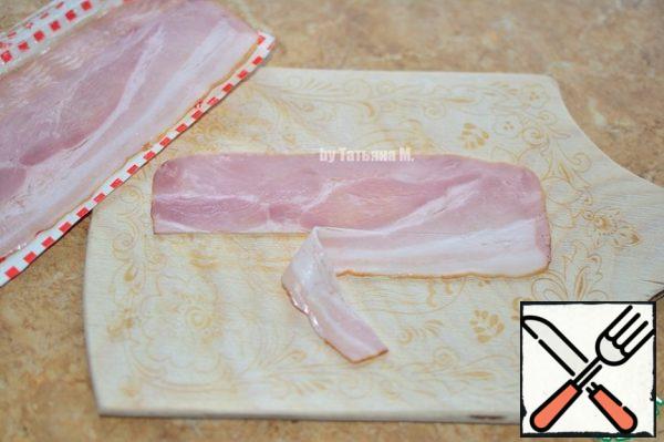 Cut the bacon into the same strips.