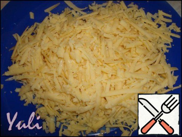 Cheese to rub on a large grater.