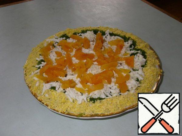 Steam dried apricots and cut into strips.
Put on top and smear with mayonnaise.