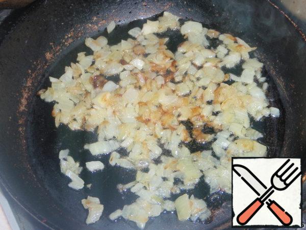 In a frying pan melt the butter. A small onion finely chop and fry a little (I fry until Golden brown).
