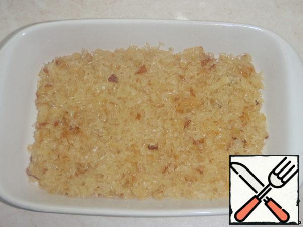 Put the rice in a baking dish.