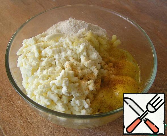 Boil potatoes in"uniform". Pass through a meat grinder peeled potatoes and Adyghe cheese. Add 2 eggs, salt, spices, corn flour, mix thoroughly.