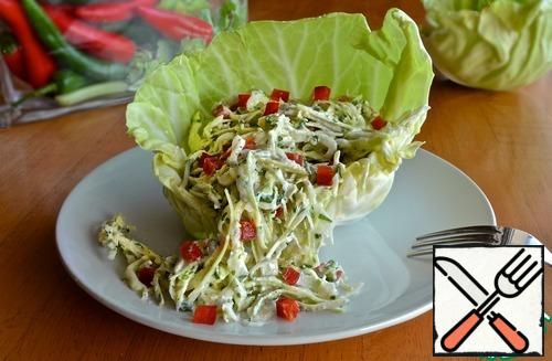 Mix cabbage with pepper, sprinkle with parsley and pour dressing. Season with salt and pepper to taste and serve.