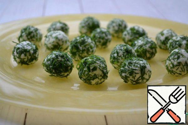 Finely chop the greens, roll the cheese balls in it.
