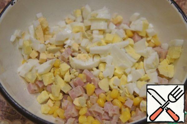 Then cut the eggs into cubes too.
