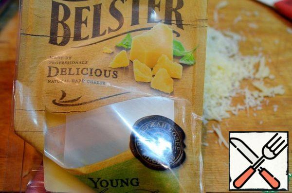 For the crumbs, grate the cheese on a fine grater.
