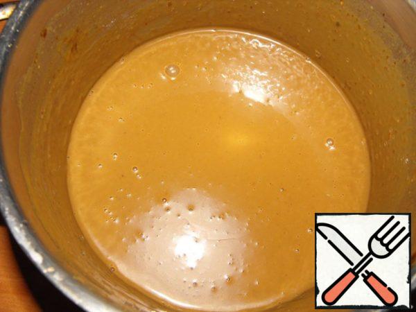 Condensed milk diluted with water.
Add coffee, dissolved in a small amount of hot water, vanillin.