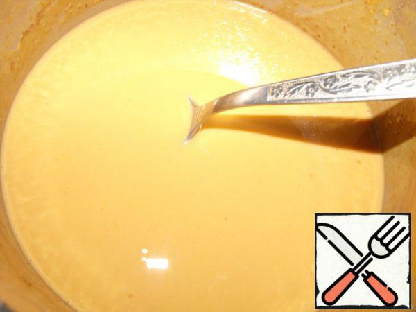 Bring to a boil. Cool slightly and pour in the vodka.
