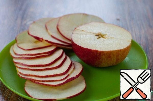 A big Apple with the help of a mandolin cut into thin slices. Dry in the oven for 20-30 minutes at 180 degrees.