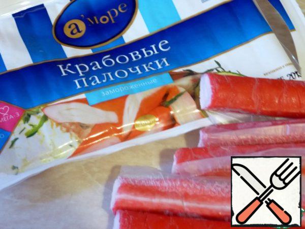 The first thing you need to do is defrost the crab sticks.
