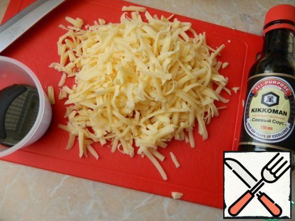 Cheese to grate. Pour the right amount of soy sauce.