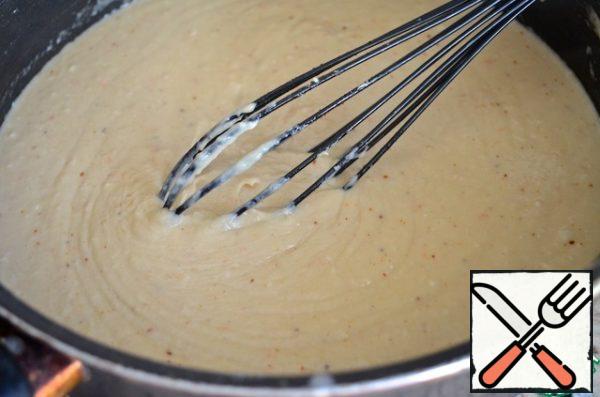 3. Pour cream into the sauce and cook for another 10 minutes on low heat. Add one spoonful of shrimp oil. Add salt, black and cayenne pepper to taste.
