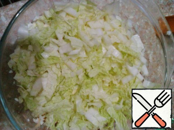 Finely chop the cabbage. Grate cheese on a small grater.