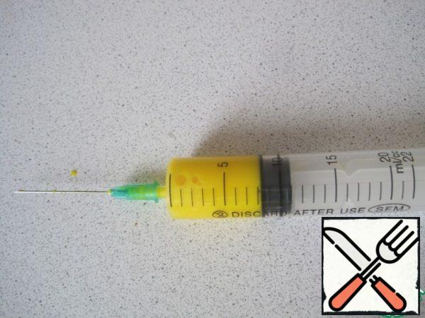 Fill a regular disposable syringe.
