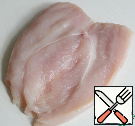 Chicken breast, cut not to end up and deploy as a book.