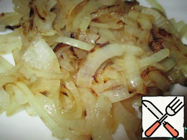 Onion cut into quarter-rings. Fry.