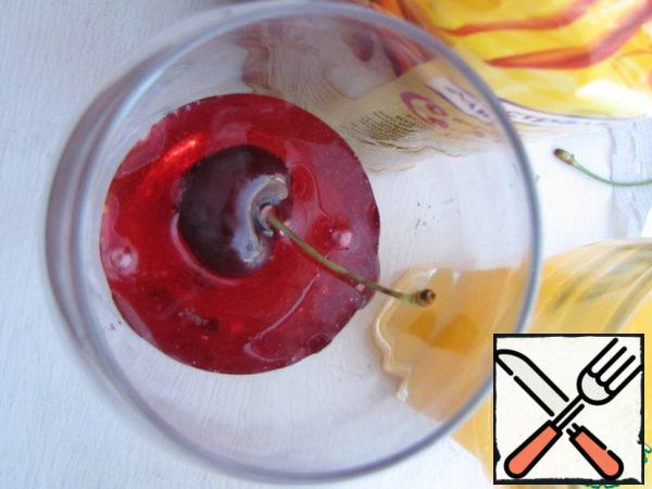 Pour the syrup into the bottom of the glass.
