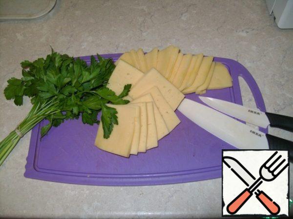 Cheese cut into slices-not very thin. It is important that the cheese melts well.