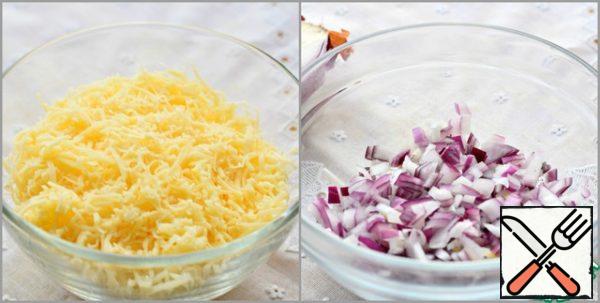 Grate cheese on a small grater.
Onions cut very finely.