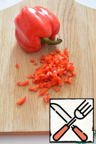 For canapés, finely chopped the red bell pepper.