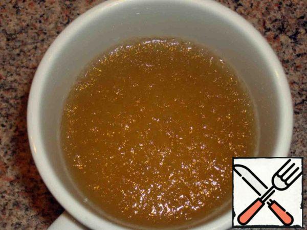 Soak the gelatin in cold boiled water until it swells.
Then drain the excess water, dissolve the gelatin in a water bath.
