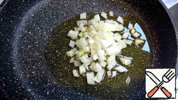 Fry the onions in olive oil-minutes 7-10, until soft. Onions should not turn brown.