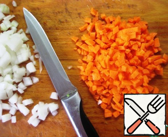 Onions and carrots cut into small pieces.