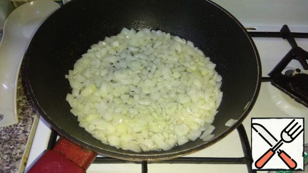 Fry in olive oil finely chopped onion until Golden brown...