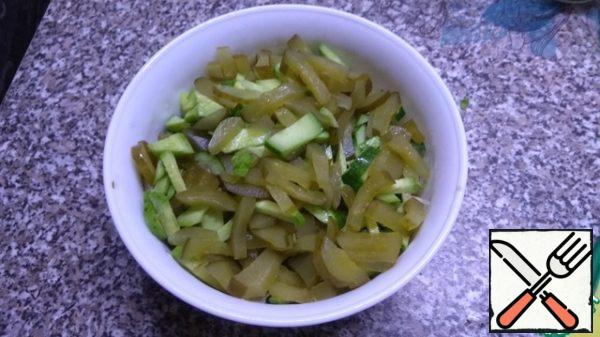 Then cut into cubes cucumbers (fresh+salty).