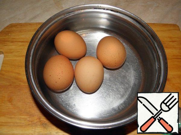 Boil eggs.