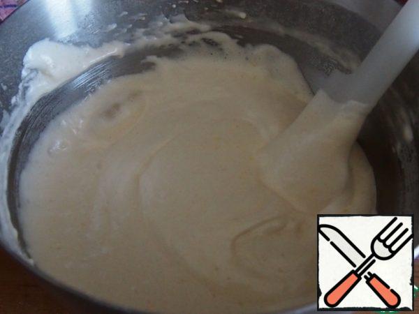 Add the sifted flour, mix gently with a spatula.
