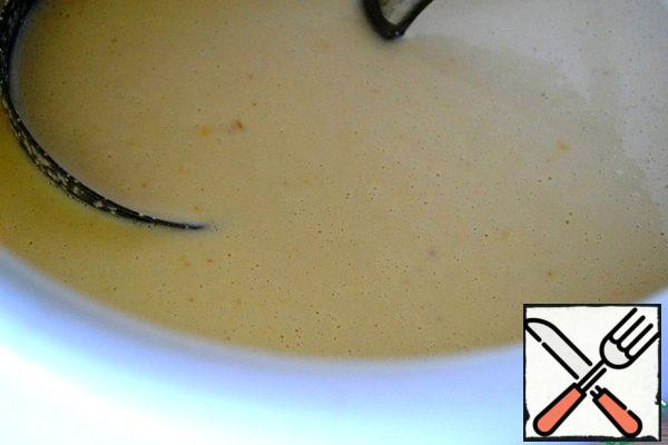 Then add vegetable oil, egg yolks and hot water, mix everything and immediately bake in a dry hot frying pan.
