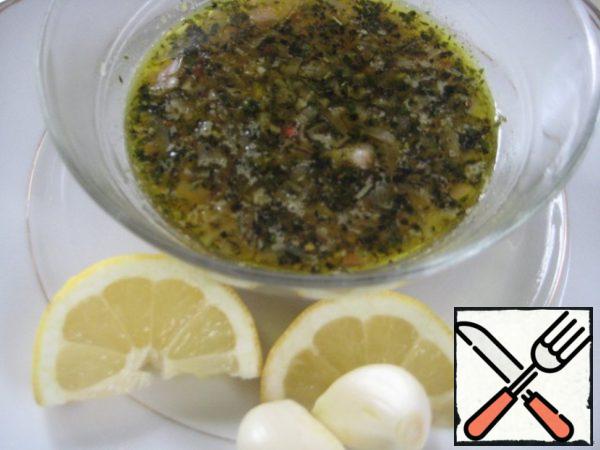 Add chopped garlic (2 cloves) and lemon juice to the marinade.
