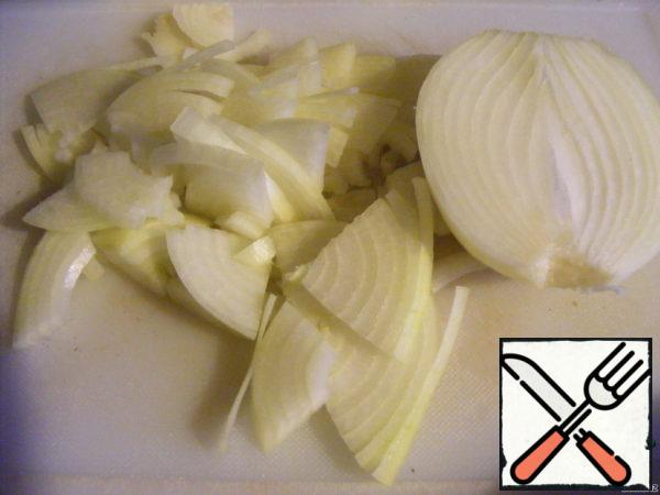Onion cut into half rings and fry in butter.