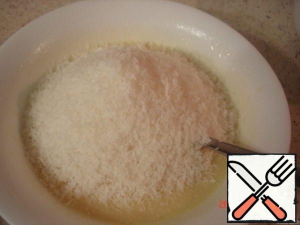 Remove from heat, add coconut chips, mix well.
