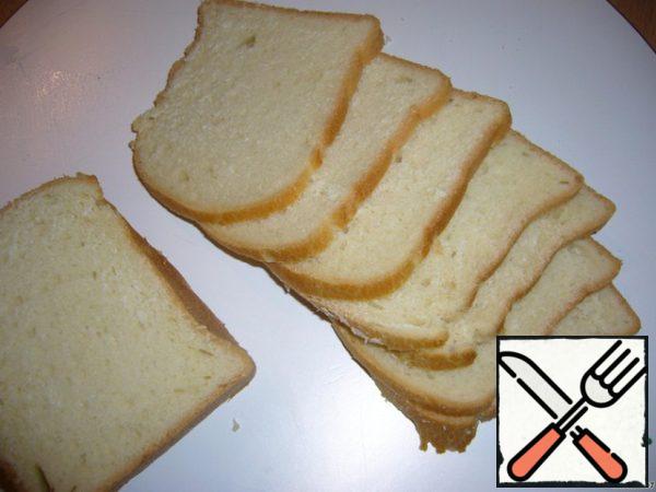 Cut the bread into thin slices, the thinner the better.
