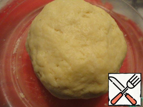 Add one 2 tablespoons of cold water. By the way, at this point, you can add the paprika, herbs, garlic, black or red pepper, etc.  Knead well. Gather the dough into a ball. Cover with plastic wrap and refrigerate for 30 minutes.