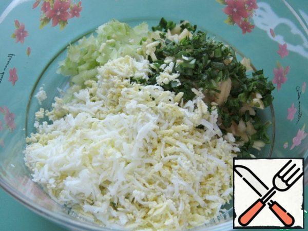 Add finely chopped greens and grated eggs to celery and apples.