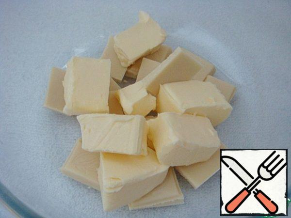 Cut the butter into pieces and break the white chocolate.