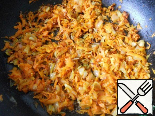 Fry onion and carrot.