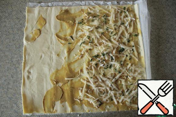 From top to grate the Parmesan or other hard salty cheese and sprinkle with rosemary.