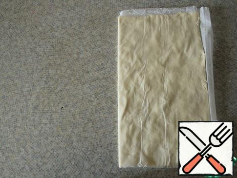 Fold the dough sheet in half.