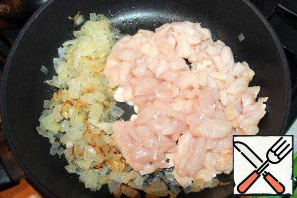 Fry onion, add finely chopped breast, simmer for 5 minutes.
