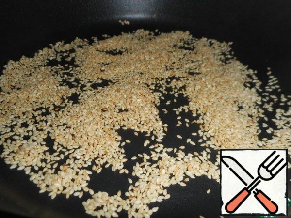 Fry sesame seeds.