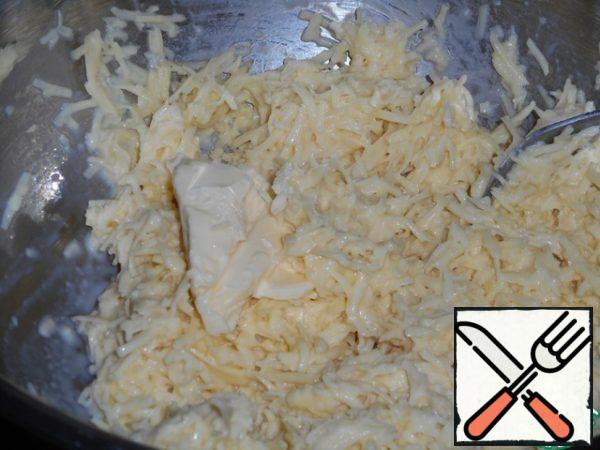 Add grated cheese, butter (soft).