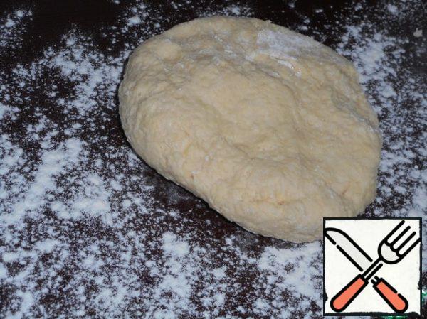 Spread the dough on a floured surface.