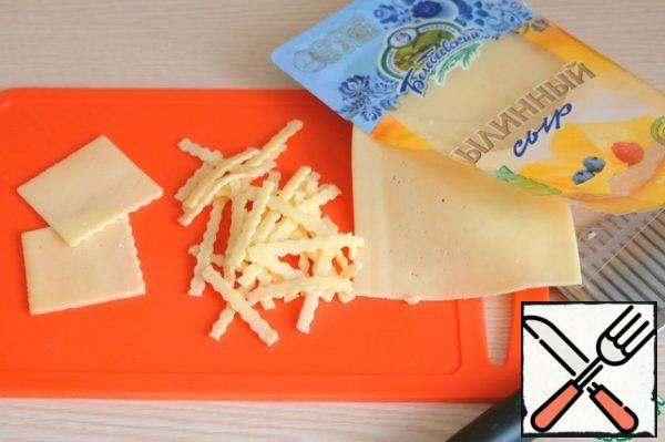Cheese (plates), cut into strips.