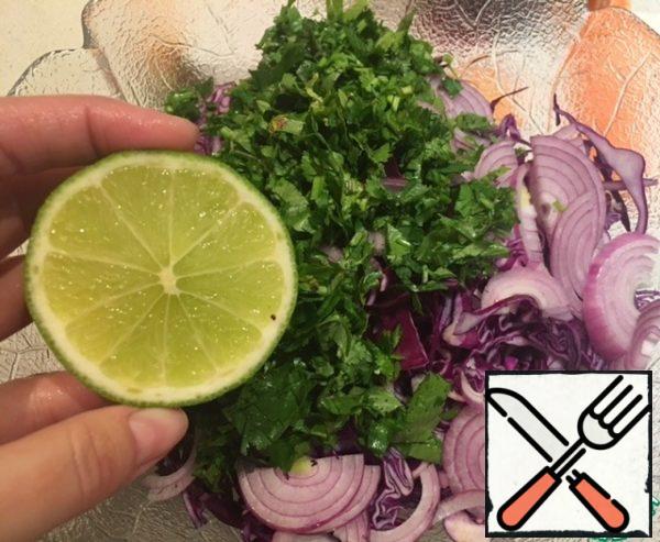 Add the juice of half a lime. Mix everything. Cabbage will start to give juice.
