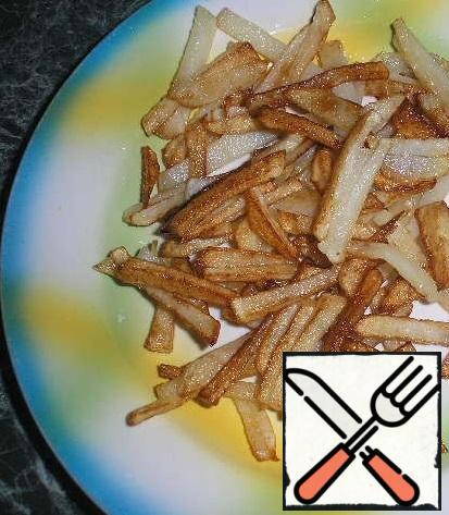 Potatoes cut into small strips and fry in vegetable oil. Salt.